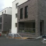 Kunststein an der Hausfassade